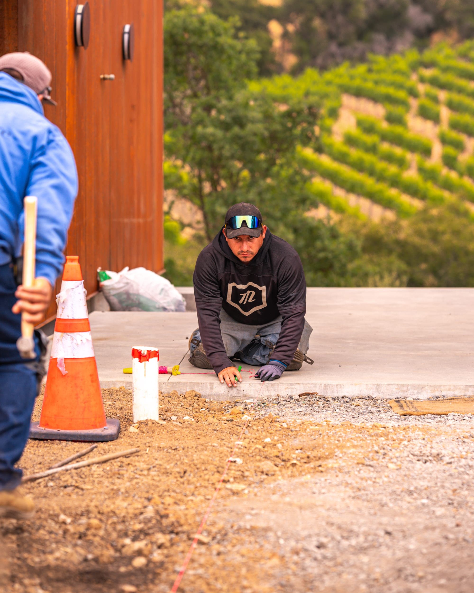 Crew member setting out the landscape installation