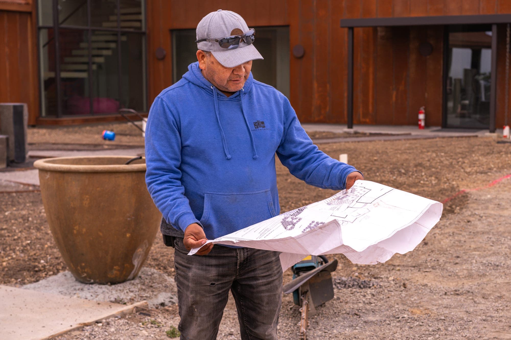 Team members coordinating beside the construction site