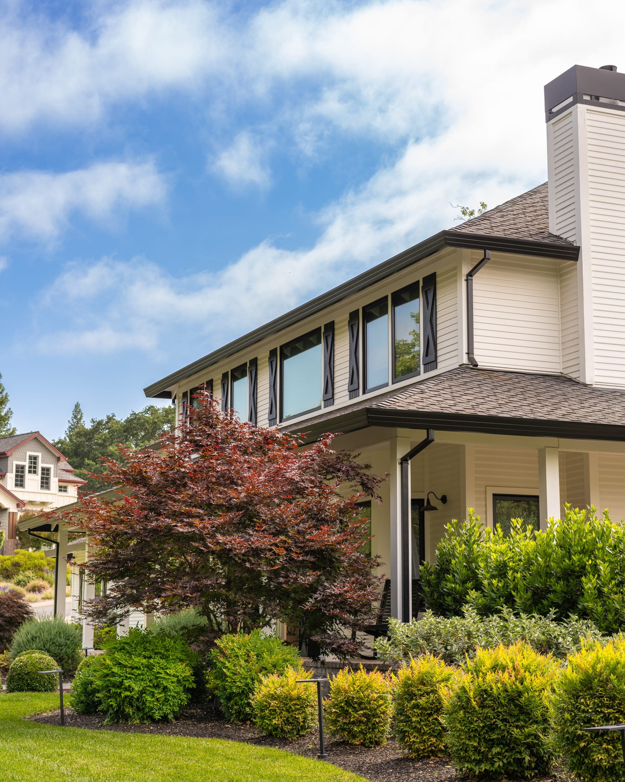 Windsor home framed by mature garden planting